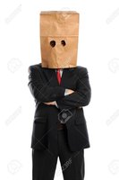 15608877-portrait-of-businessman-with-paper-bag-over-head-isolated-over-white-background.jpg